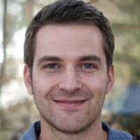 Smiling male recruiter using MatchCard for candidate screening